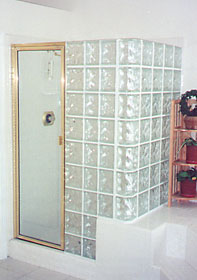 Decora pattern shower walls with installed door.